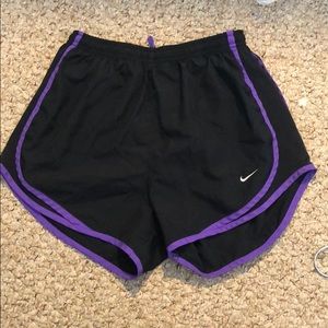 Purple and black nike shorts